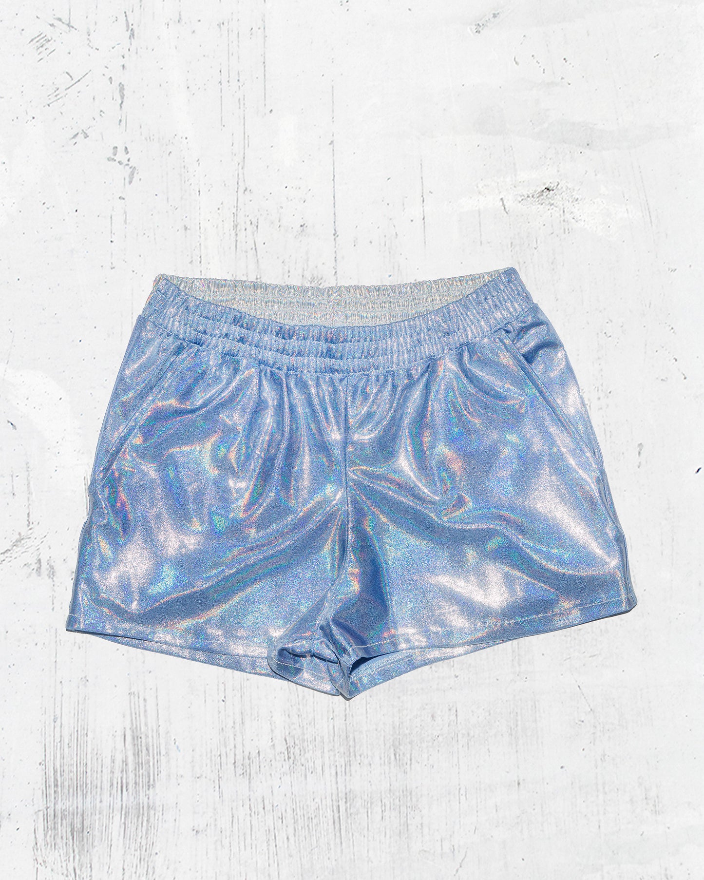 Dazzle the Night with Men’s Baby Blue Holographic Short Shorts