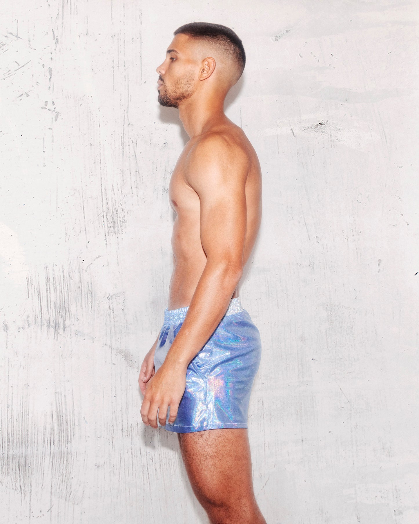Dazzle the Night with Men’s Baby Blue Holographic Short Shorts