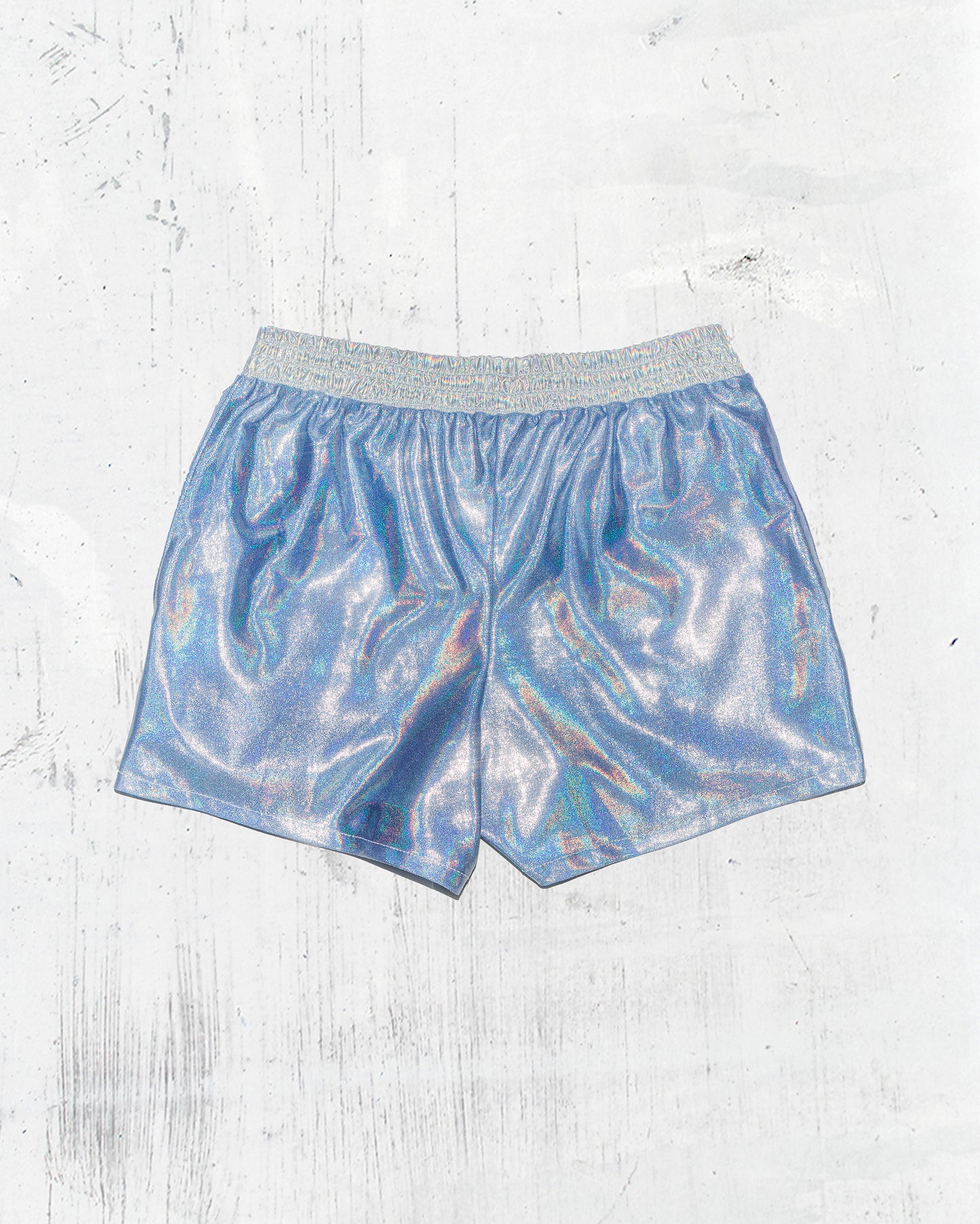 Dazzle the Night with Men’s Baby Blue Holographic Short Shorts